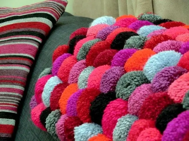 Coperta con pompon